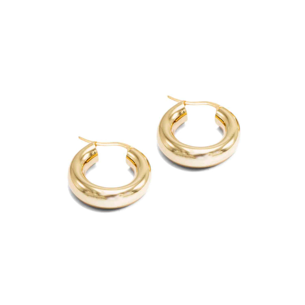 Close up image of the chunky hoops in gold vermeil