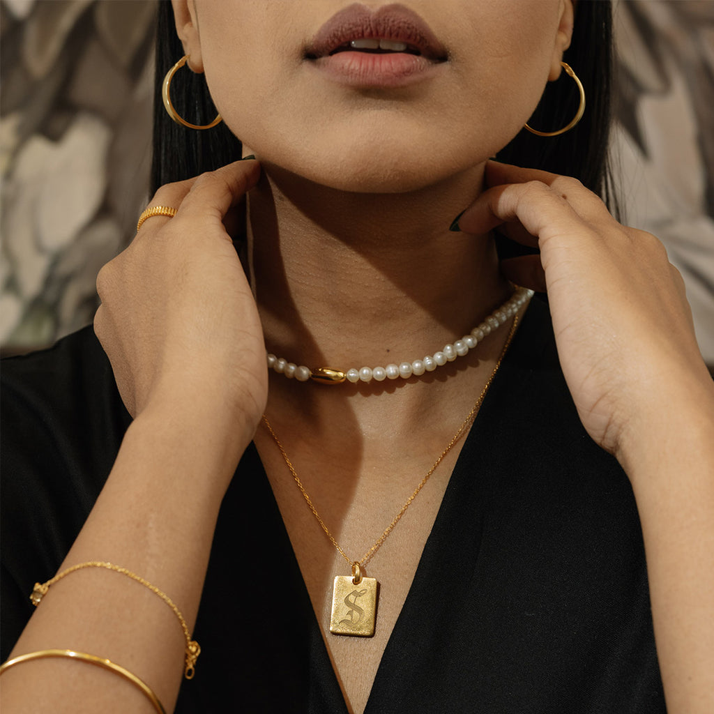 Elegant and beautifully designed 14kt Gold and Pearl Necklace styled by Model